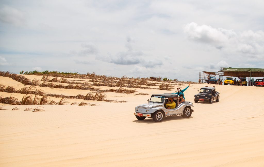 Natal, Rio Grande do Norte, Brazil - March 12 2021: Image of buggy car in the sands of Natal, Rio Grande do Norte, Brazil.