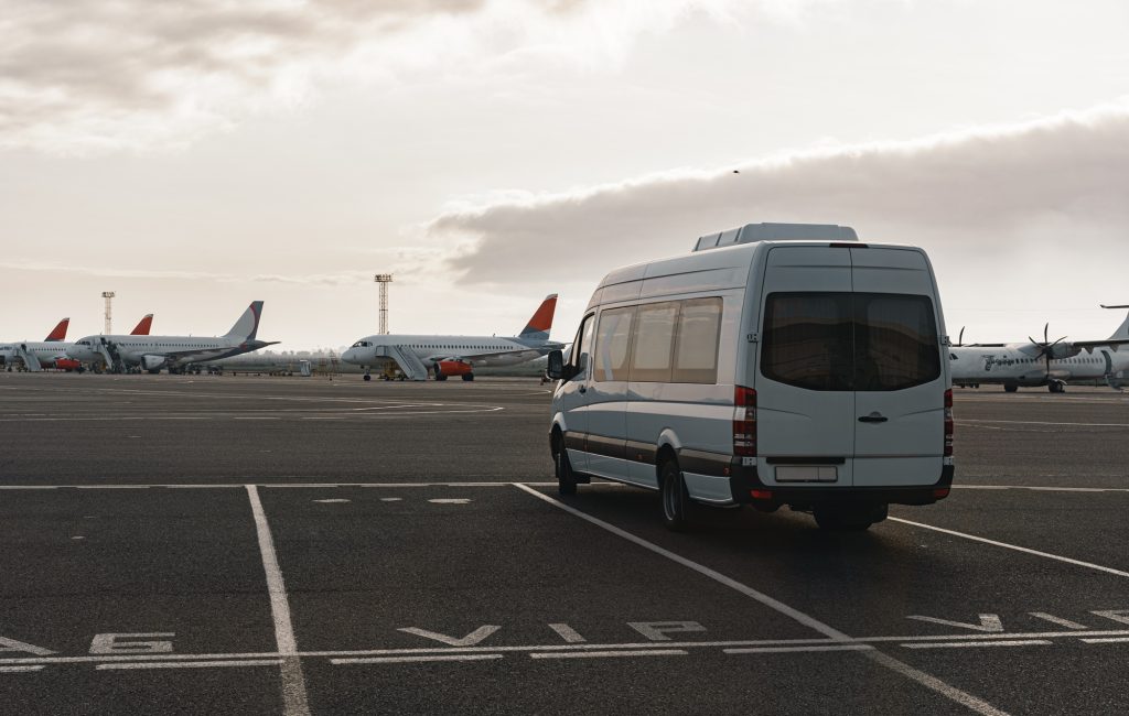 Minibus on a parking lot in airport area